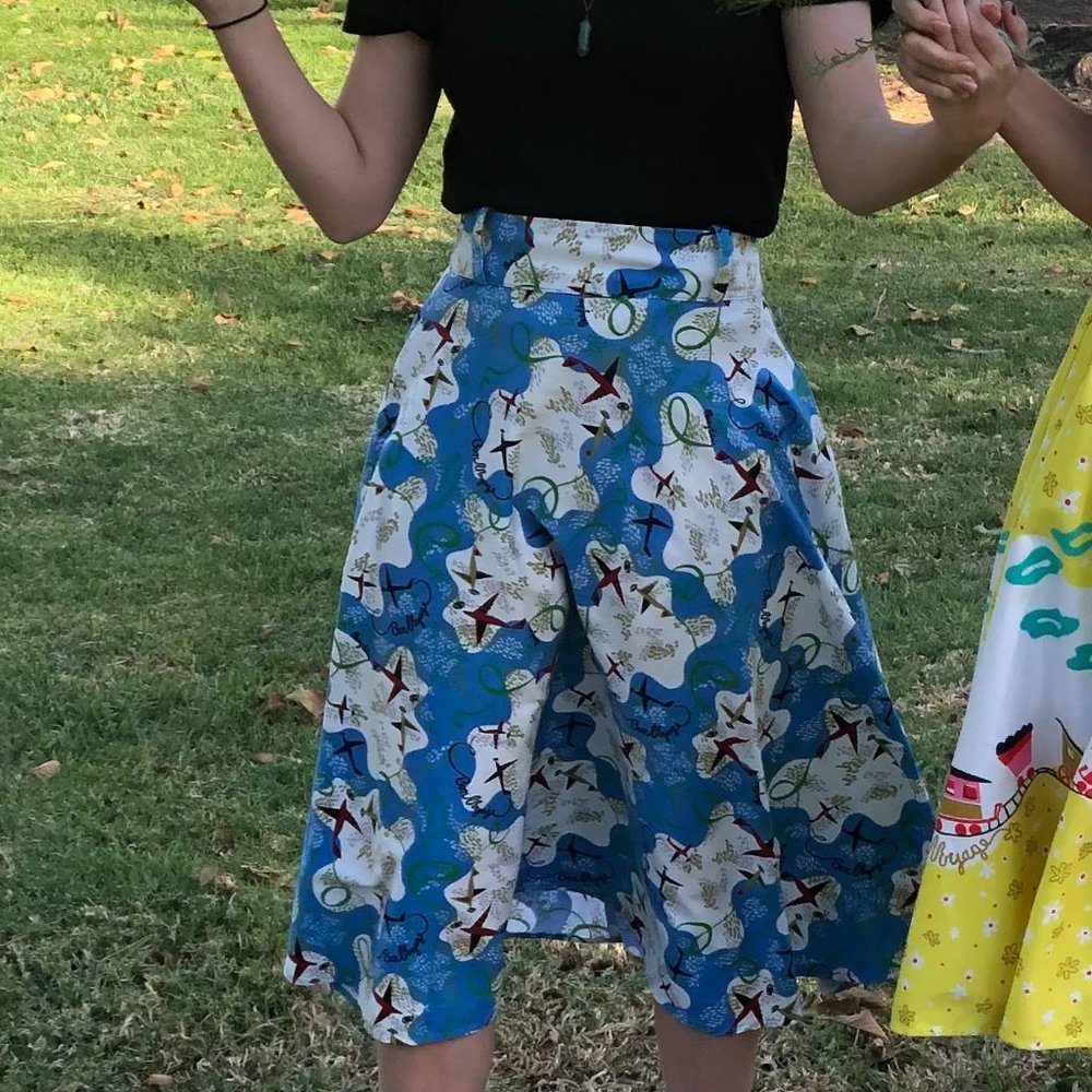 Pinup Couture Doris Skirt in Mary Blair "Bon Voyage" Blue Airplane Print, Small